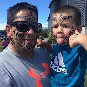 Matt and Issac Keil with their Ta Moko on Children’s Day, Gore 2018