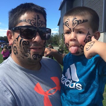 Matt and Issac Keil with their Ta Moko on Children’s Day, Gore 2018