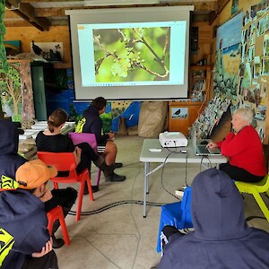 Tauira and Anna pay close attention to slideshow given by Chris Rance.