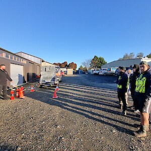 Daniel Munro running the tīma through live fire extinguisher training.