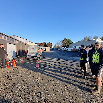 Daniel Munro (from PWFP Fire Safety) running the tīma through live fire extinguisher training.