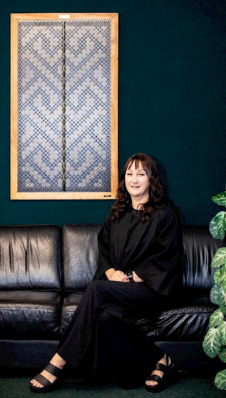 Keri-lee is a woman of many talents. She created this Tukutuku panel for the Kia Tū classroom at SIT. This Tukutuku is named Te Ara Tipu which means the Pathway to Growth. The centre depicts the pathway and is surrounded by aroha for growth. It also shows that sometimes we may have blocks and need to work our way through it, but in the end we can get there. The bottom and top of the pathway are left open to show that the pathway can keep going and it never stops. Each side of the Tukutuku depicts a feminine and masculine side.
