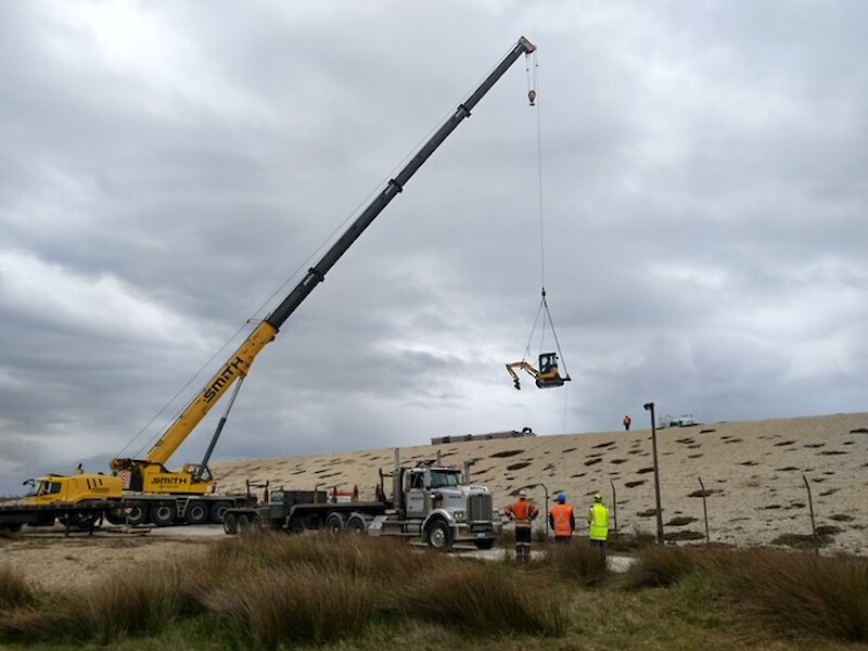 A small excavator was craned onto the SCL pad recently to aid in SCL sampling.